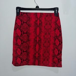 Red snake skin design skirt.